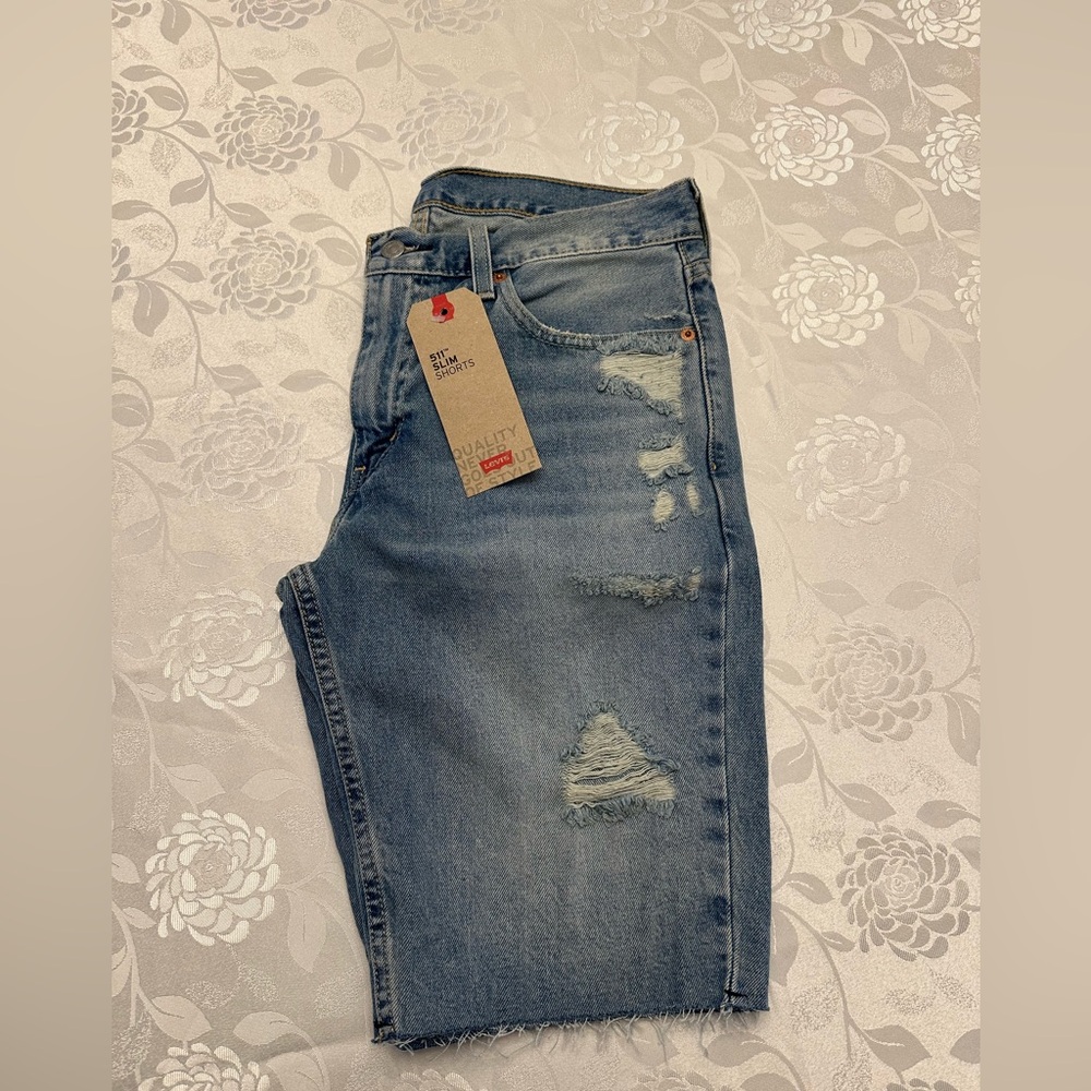 Levi's Light Blue Distressed Denim Shorts